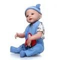 Lifelike baby doll in blue car-themed outfit with knit hat and soft matching trousers - Blue and White Car Outfit / 57cm
