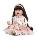 Lifelike long hair princess doll in floral dress and white cardigan on a white background - 55 cm / Girls