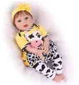 Realistic reborn baby doll in yellow outfit and floral headband with cow print pants - Yellow Top Cow Pants (4) / 55 cm