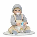 Realistic reborn baby doll in striped outfit with magnetic pacifier and blue bottle - As Shown / 57cm