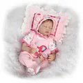 Realistic reborn doll in pink outfit with elephant patch and toy bottle detail - Pink (Girl, With Pillow) / 55 cm