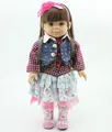 Detailed front view of a realistic doll with brown hair and floral tiered skirt - 45 cm / Denim Floral Outfit