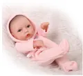 Miniature reborn baby doll with blue eyes wearing a soft pink plush hooded romper - Pink Bow Hooded Style