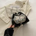 Black vintage Chinese bucket bag with floral embroidery and elegant pearl tassels - Black