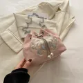 Pink satin bucket bag with floral embroidery and elegant pearl tassels charm - Pink