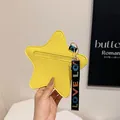 Star-shaped small crossbody coin purse in bright yellow faux leather with litchi texture - Yellow