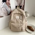 Minimalistische beige casual rugzak voor studenten met modieus logo-detail - Khaki