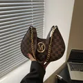 Retro brown monogram underarm bag with golden M-logo and chain strap detail - Retro Paisley Print / Brown