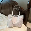 Women's white tote bag set with pink floral and red bow prints in textured PU leather - White