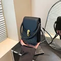 Black woven mini crossbody bag with golden metal hardware and top handle for women - Black