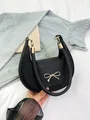 French crescent shoulder bag in black crossgrain leather with golden bow hardware - Cross Grain (jl8588) / Black