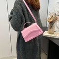 Pink glossy patent leather crossbody bag with stylish wave pattern embossing detail - Pink