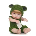 Lifelike reborn baby doll in green handmade crochet frog outfit on white background - Green / 27cm