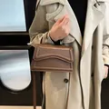 Minimalist chocolate brown crossbody bag with wave edge flap and top handle for women - Dark Brown