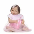 Realistic reborn baby doll in pink lace dress with nursing bottle and headband - 56cm / Pink (As Shown)