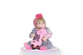 Detailed view of reborn baby doll with blue eyes, pink pacifier and giraffe plush toy - Single Piece / 57cm