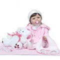 Realistic reborn baby doll in pink hoodie with plush bear toy and heart magnetic pacifier - Pink