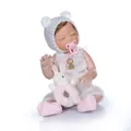 Lifelike reborn baby doll in white bear outfit with plush bunny and pink pacifier - Closed Eyes Style (With Rabbit Plush Toy) / White / 48cm