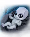 Close-up of lifelike purple alien baby doll with detailed skin texture on dark cloth - Silver