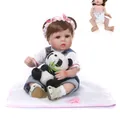 Lifelike reborn baby doll in denim overalls with panda plush and pacifier accessory - 47cm (Full Body Vinyl) / White