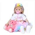 60cm reborn doll with blonde hair, colorful tutu, flower headband, and pink plush bear - Pink Floral Style / 60 cm