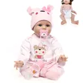 Lifelike reborn baby doll with pink bear outfit, magnetic pacifier, and feeding bottle - 47cm (Full Body Vinyl) / Pink