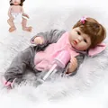 Reborn baby doll in pink and grey fleece jumpsuit with bow headband and bottle - 47cm (Full Body Vinyl) / Silver