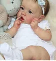 Lifelike 22-inch reborn baby girl doll with blue eyes and realistic skin texture detail - Full Silicone Girl Style / Exquisite Blue Floral Painted Style