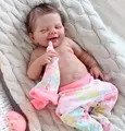22-inch full body silicone reborn baby doll with floral pants on grey woven mat - Simple Painting 3(2005) / 55cm Silicone Body Boy