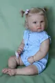 Dettagli della bambola Reborn Charlotte con pelle realistica e codini biondi - Stile Blu a Pois (Come Mostrato) / 60 cm