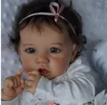 Lifelike 22-inch reborn toddler girl with curly brown hair and pink ribbon headband - Full Silicone Girl Style / Exquisite Pink Ribbon Painted Style