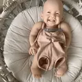 Kit poupée Reborn réaliste avec visage rieur et barboteuse rose pour accessoires - Style 13 (Expression de Rire)