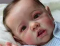 Lifelike 22-inch reborn baby girl doll with realistic facial details and blue knit outfit - Full Silicone Girl Style / Standard Light Blue Knit Style