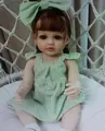 Lifelike 55cm reborn baby doll wearing a green plaid dress and matching bow headband - Green Checkered Dress Style (3) / 3D Exquisite Painted