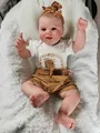 Reborn doll in white t-shirt and brown polka dot shorts with a matching headband - Short Sleeve Style / 60CM