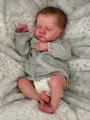 Detailed realistic skin texture and sleep posture of a 19-inch lifelike reborn baby doll - Exquisite Painted Full Silicone Boy Style