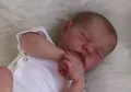 Macro detail of 19 inch Levi reborn doll showing realistic skin texture and facial features - Refined Painting Cloth Body Style (CUS60)