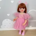 Muñeca Betty Reborn realista de 55cm con pelo castaño y vestido de tul rosa - Estilo de Simulación de Vinilo Completo / 55 cm