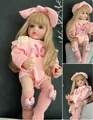 55 cm realistische Reborn-Babypuppe Betty mit rosa Hasen-Outfit und goldenen Locken - Rosa Hase / Rosa / 55 cm