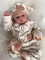 Close-up of Elijah reborn doll with realistic skin texture and bear pattern outfit - 49cm Cloth Body / Blue (1)