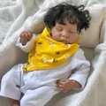 Reborn baby doll Levi Awake with realistic skin texture and curly hair in yellow bib - Cloth Body Style / 49cm