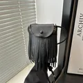 Retro black faux suede crossbody phone bag with fringe details and a tassel design - Black
