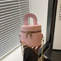Sac seau rose clair tendance avec double fermeture éclair et chaîne dorée - Rose