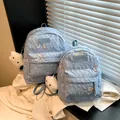 Light blue quilted backpack set with embossed texture and cute cloud charm accessory - Large / With Charm / Blue