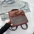 Dark brown backpack with transparent PVC window and adjustable straps for women - Brown