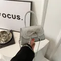 Silver sequin mini handbag with rhinestone bow and metal chain strap for party - Silver
