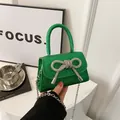 Sparkling green sequin mini crossbody bag with rhinestone bow and chain strap - Green