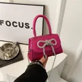 Pink sequin mini handbag with rhinestone bow and silver chain strap for women - Rose Pink
