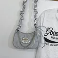 Silver-grey crescent underarm bag with pearl bow and ruffled drawstring strap - Silver