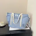 Light blue ita bag tote with clear window and star details for pins and badges - Blue